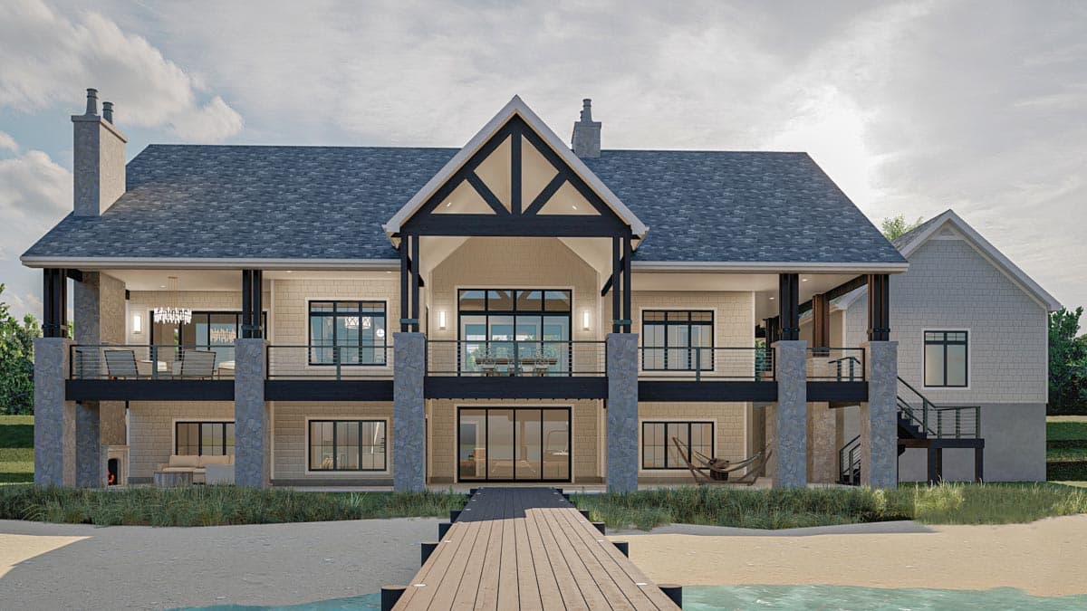 House plan exterior: Two-story modern home with covered balconies, gables, stone accents, and a prominent central gable with exposed beams.