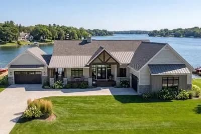 New American Lake House Plan with Full Wraparound Deck and Split Garages - 2435 Sq Ft