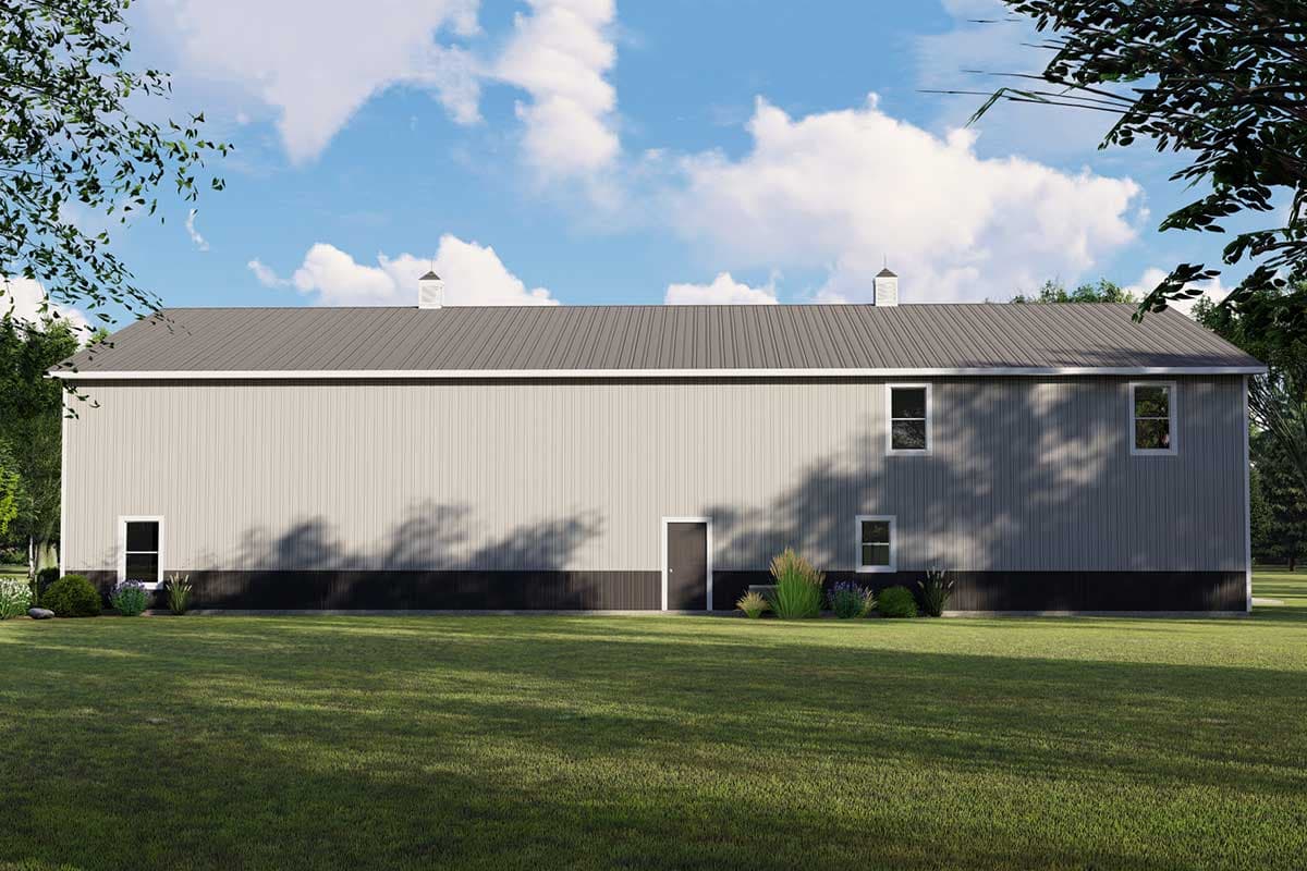 Modern barn house plan exterior with a gray metal roof, vertical siding, and a dark wainscoting.