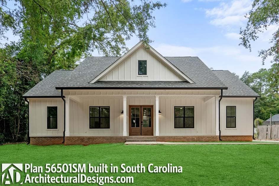Modern Farmhouse house plan exterior with a wide front porch, board-and-batten siding, and a prominent gable.