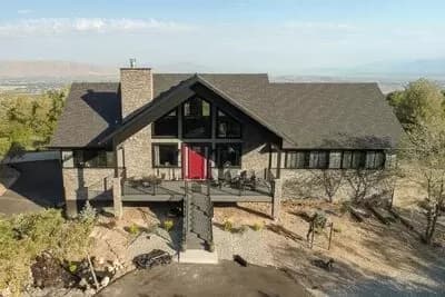 Mountain Ranch Home Plan with Sunroom and Lower Level Garage