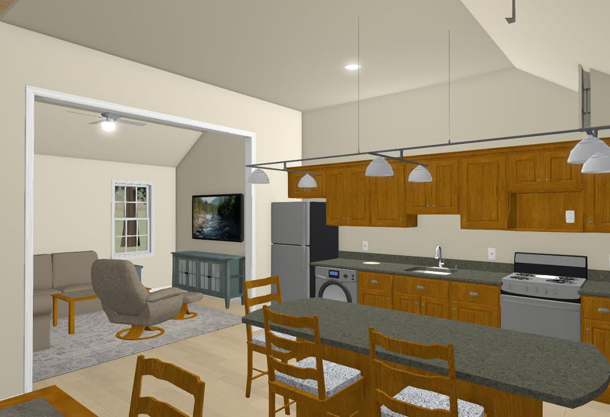 Open concept living and kitchen area with vaulted ceiling, island with pendant lights, and wood cabinetry.