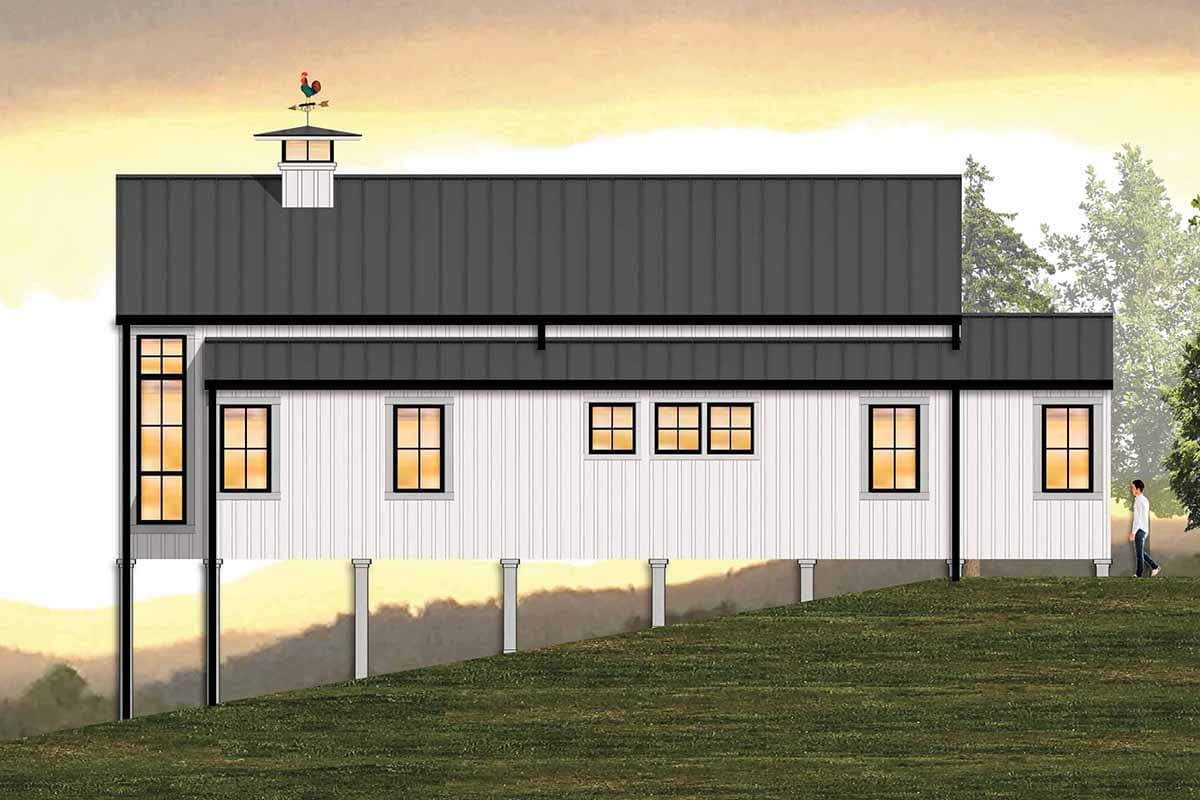 House plan exterior featuring a metal roof, white board and batten siding, and multiple window arrangements. A weather vane tops a cupola.