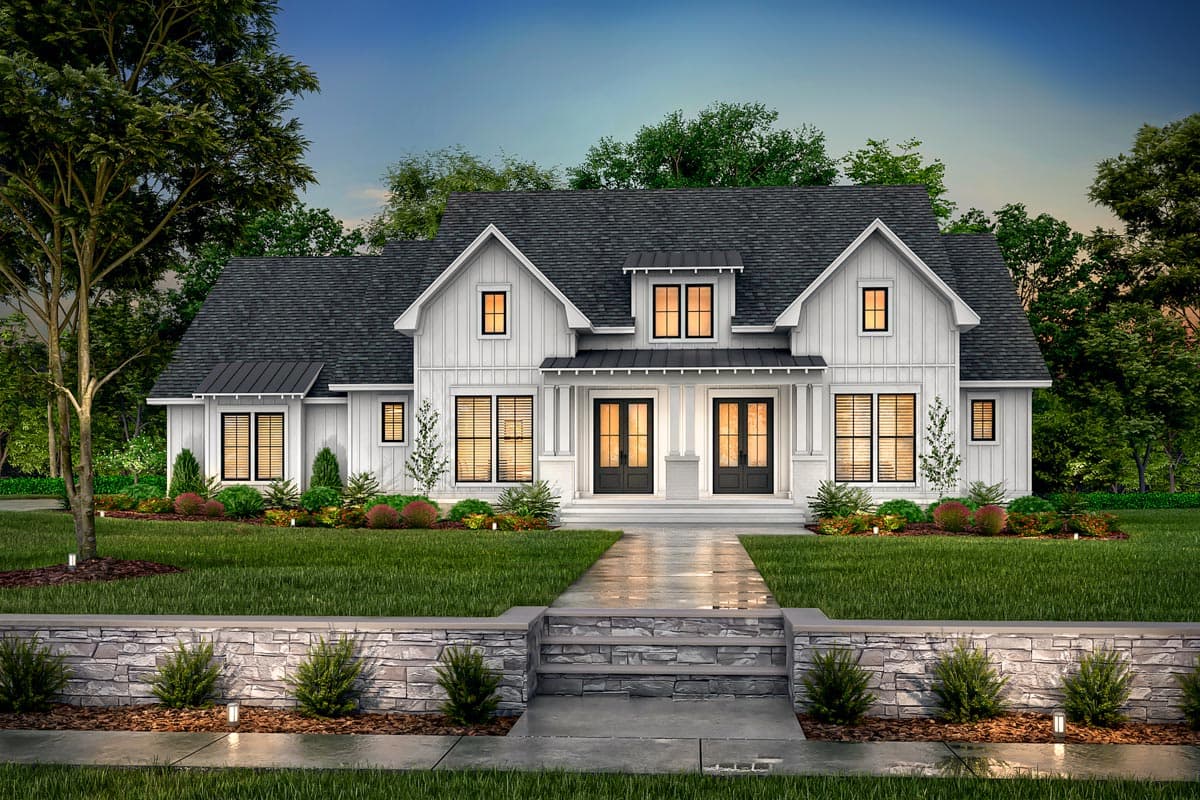 Modern Farmhouse house plan exterior with white board and batten siding, gables, metal roof dormers, and double front doors.