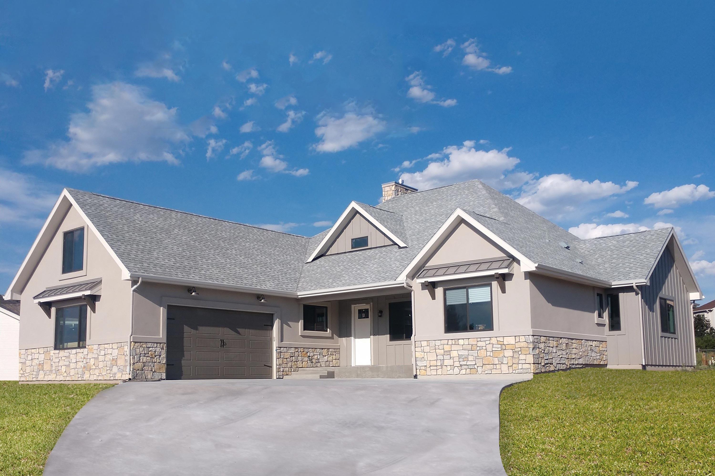 House plan exterior featuring a one-story, modern farmhouse style home. Key features: gables, stone accents, and a front-facing garage.