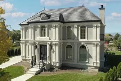 Exclusive Georgian Home Plan with Home Office and Two Master Suites