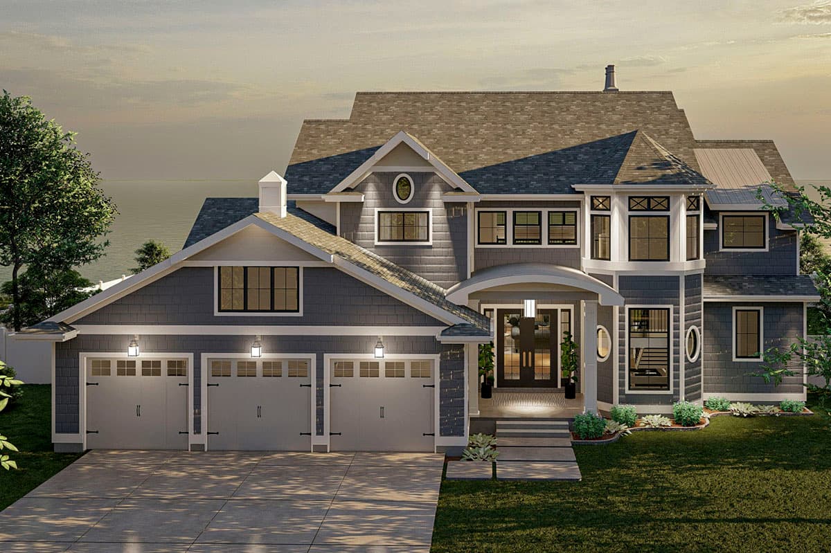 House plan exterior: Craftsman style, two stories, with a three-car garage, prominent gables, and a covered entry.