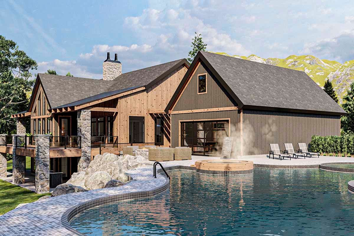 Modern farmhouse house plan exterior with stone accents, prominent gables, large windows, and a multi-level deck overlooking a pool.