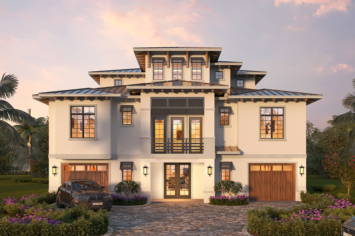 House plan exterior. Two-story Mediterranean style home with multiple rooflines, dormers, and a two-car garage. Features a balcony and porte-cochere.