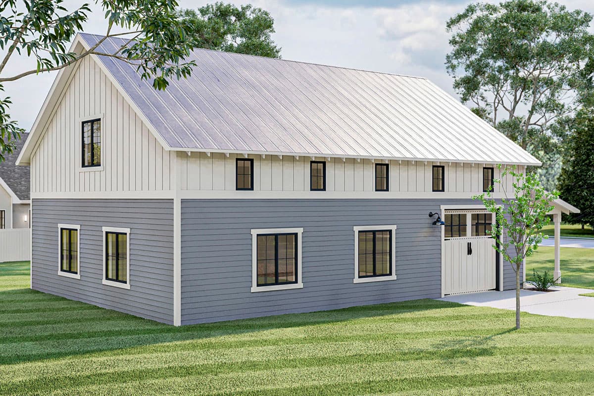 Two-story Modern Farmhouse exterior with gray siding, white board and batten, metal roof, and attached garage.