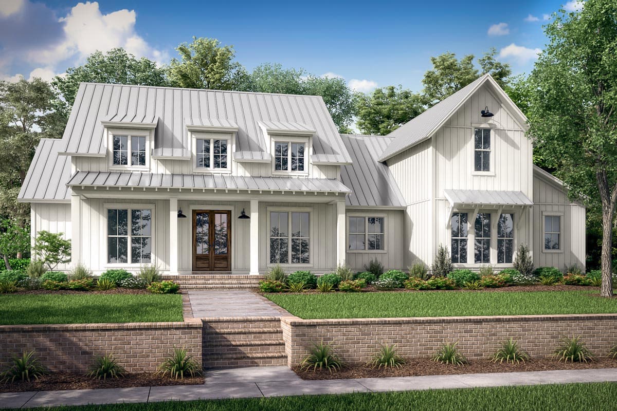 House plan exterior. Two-story Modern Farmhouse with a metal roof, dormers, and a covered porch. Gable roof and sidelights flanking the front door.