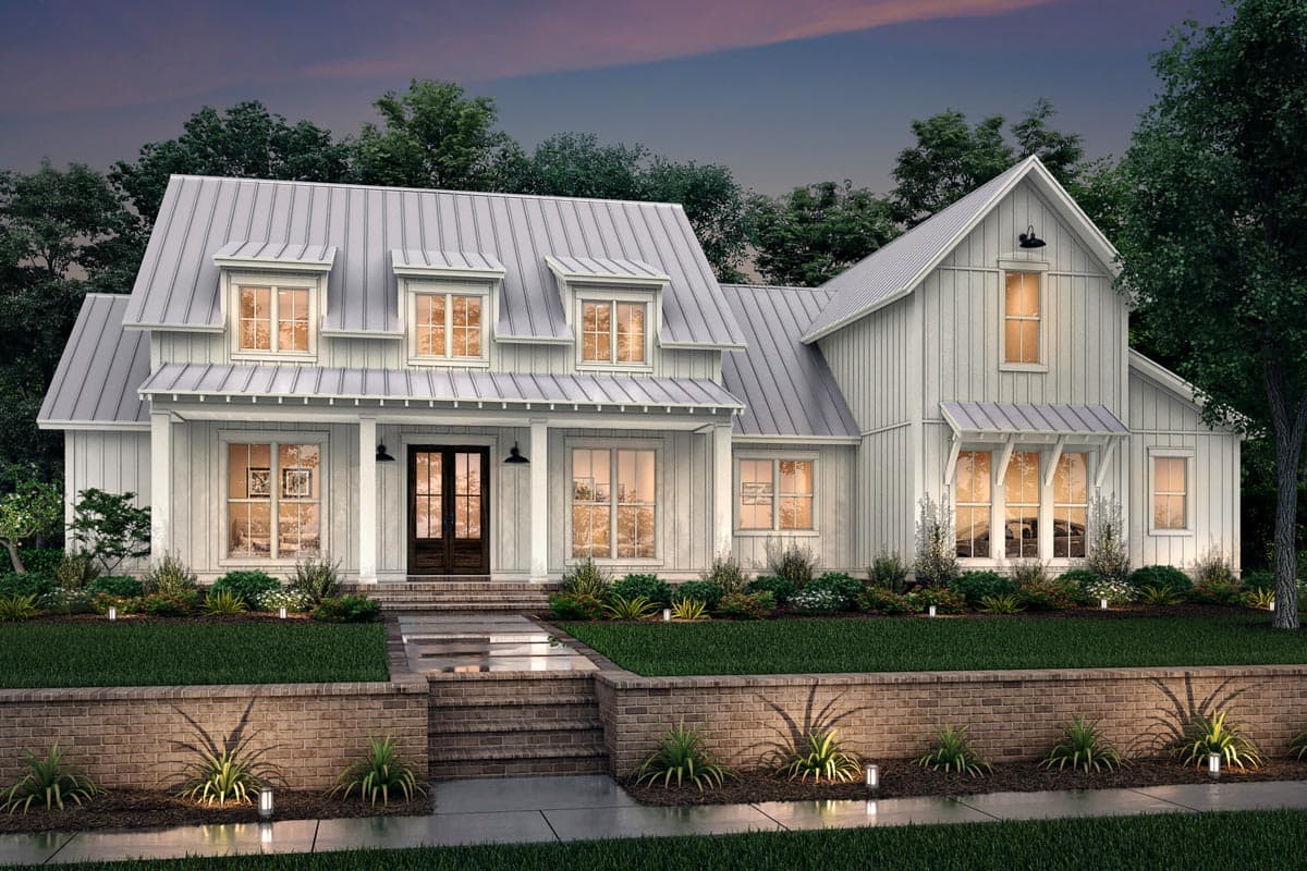 Modern Farmhouse house plan exterior with metal roof, dormers, a covered porch, and board and batten siding.