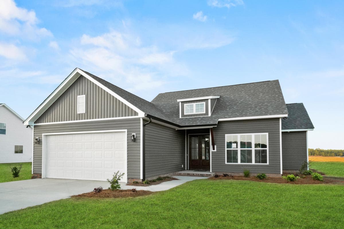 House plan exterior: One-story Modern Farmhouse with a two-car front-entry garage, gable, and dormer.