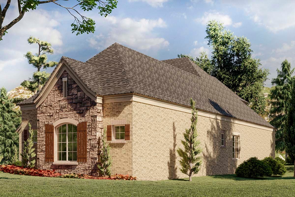 House plan exterior with stone accent, arched window with shutters, and brick facade. One and a half stories with gables.