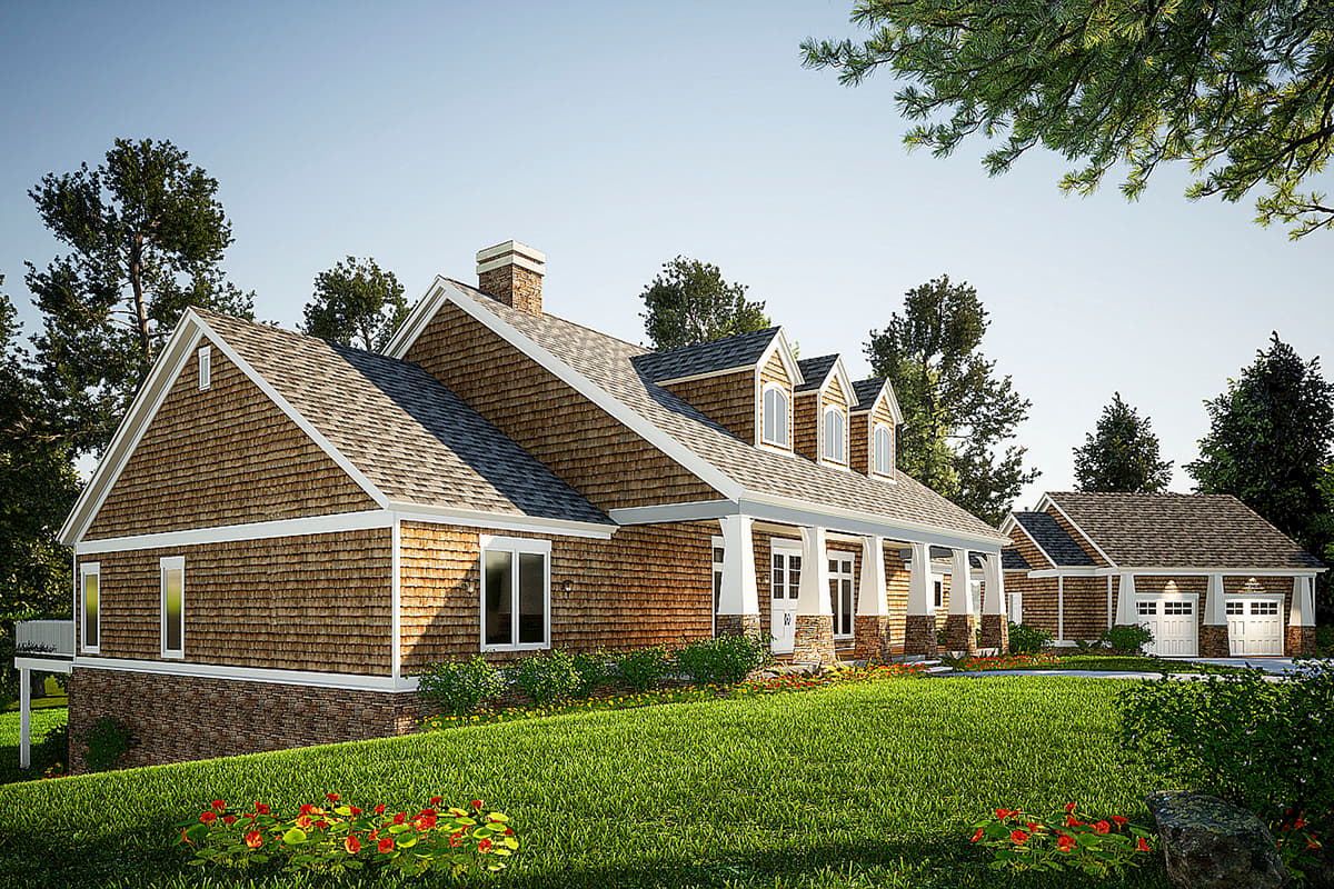 House plan exterior: one-and-a-half stories, cedar shingle siding, prominent gables, dormer windows, and covered front porch.