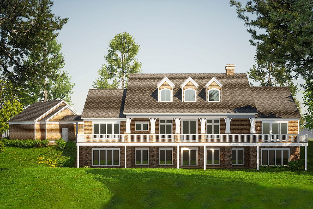 House plan exterior. Two-story home with cedar shingles, a wide covered porch, three dormers, and a multi-level foundation.