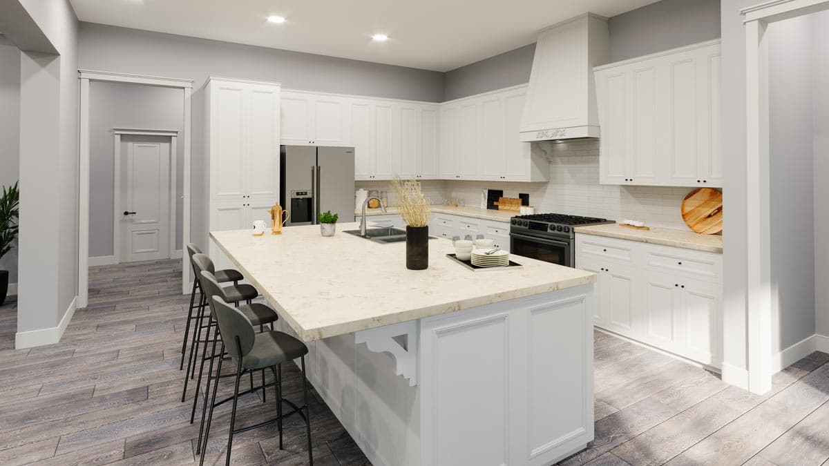 Kitchen with large island, white cabinets, stainless steel appliances, gas range, and hardwood floors.