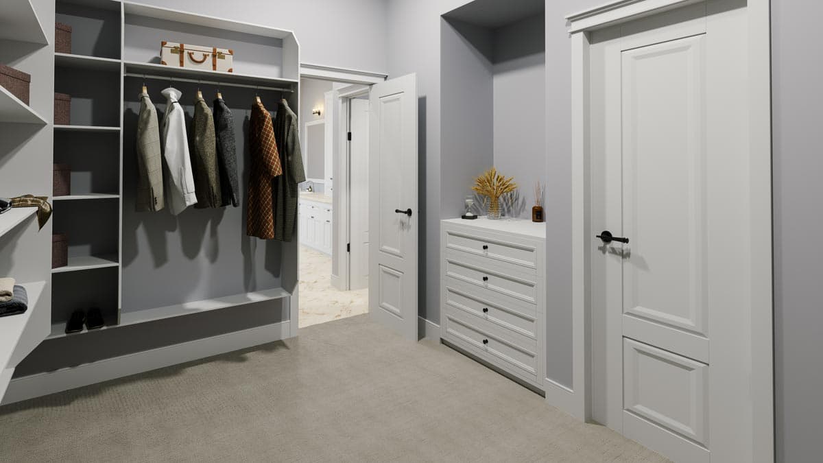 Walk-in closet with built-in shelving, hanging clothes, dresser, and adjoining bathroom access.
