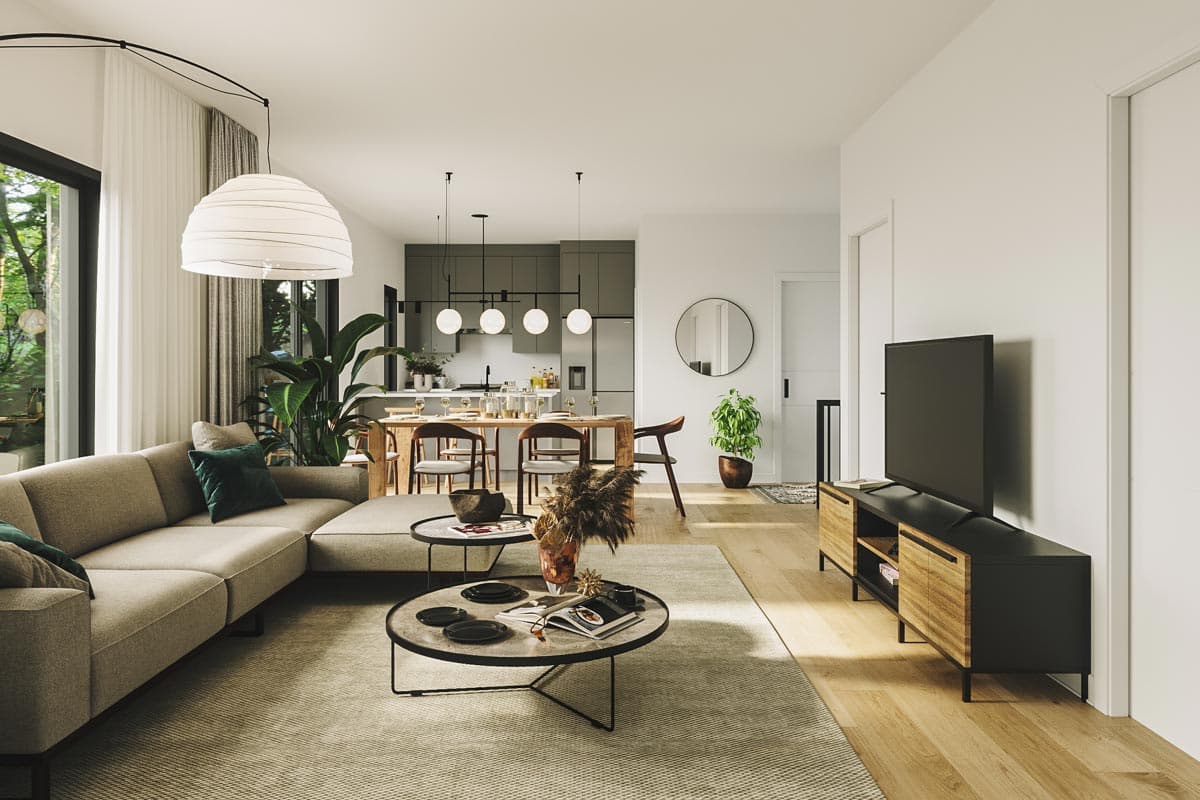 Open-concept living and dining area with modern kitchen, large windows, and sectional sofa.