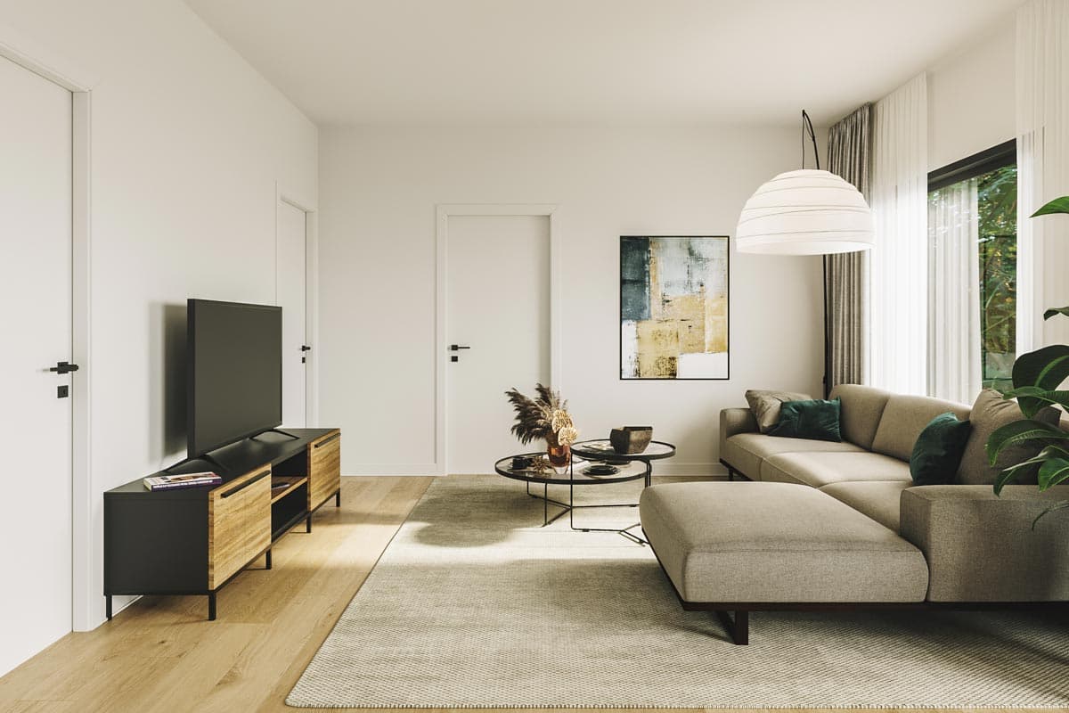 Living room with sectional sofa, coffee table, media console with television, abstract art, and large windows.