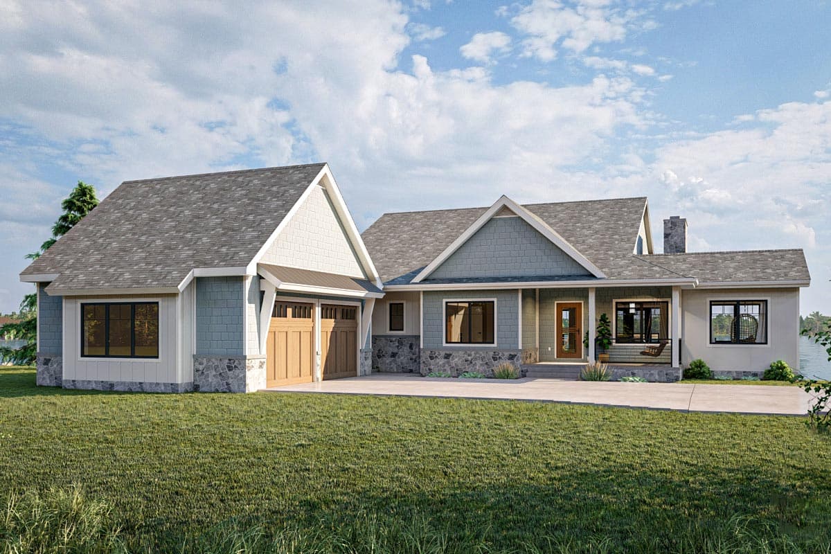 House plan exterior with Craftsman style. Features include gabled rooflines, a front porch, and a two-car garage. Stone accents are present.