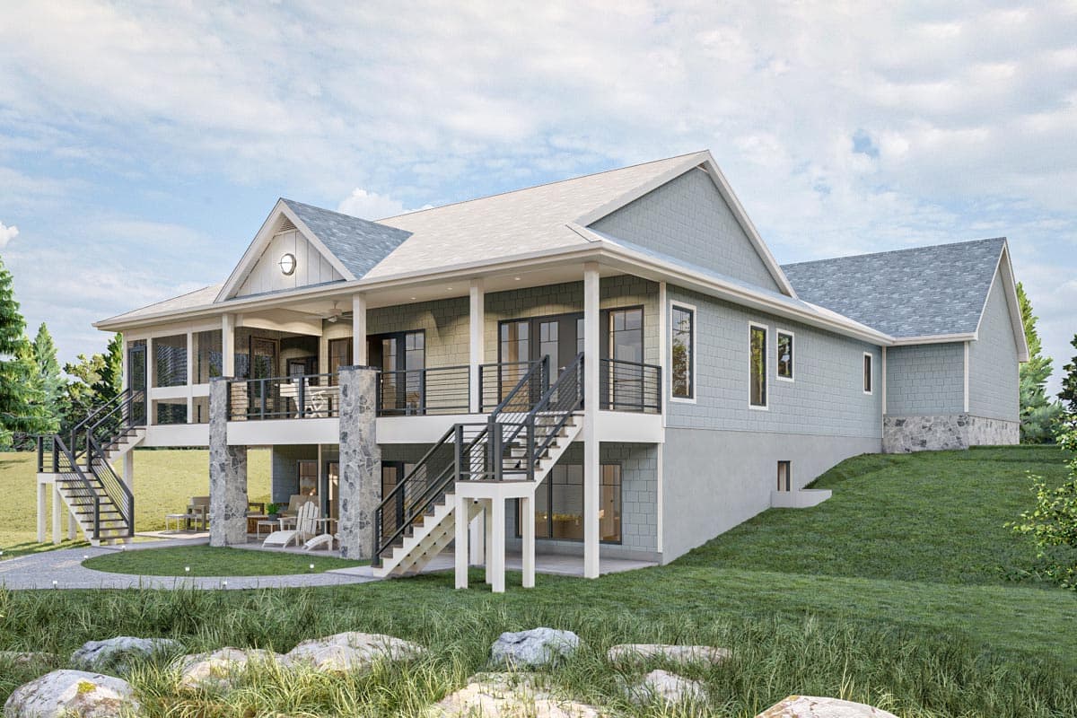 House plan exterior: Ranch style with wrap-around covered porch, stone accents, and multiple staircases.