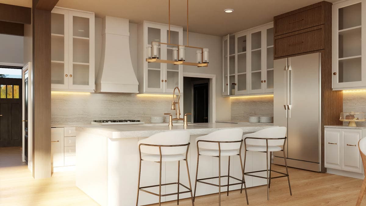 Kitchen with island, white cabinetry, stainless steel refrigerator, range hood, and bar stools.