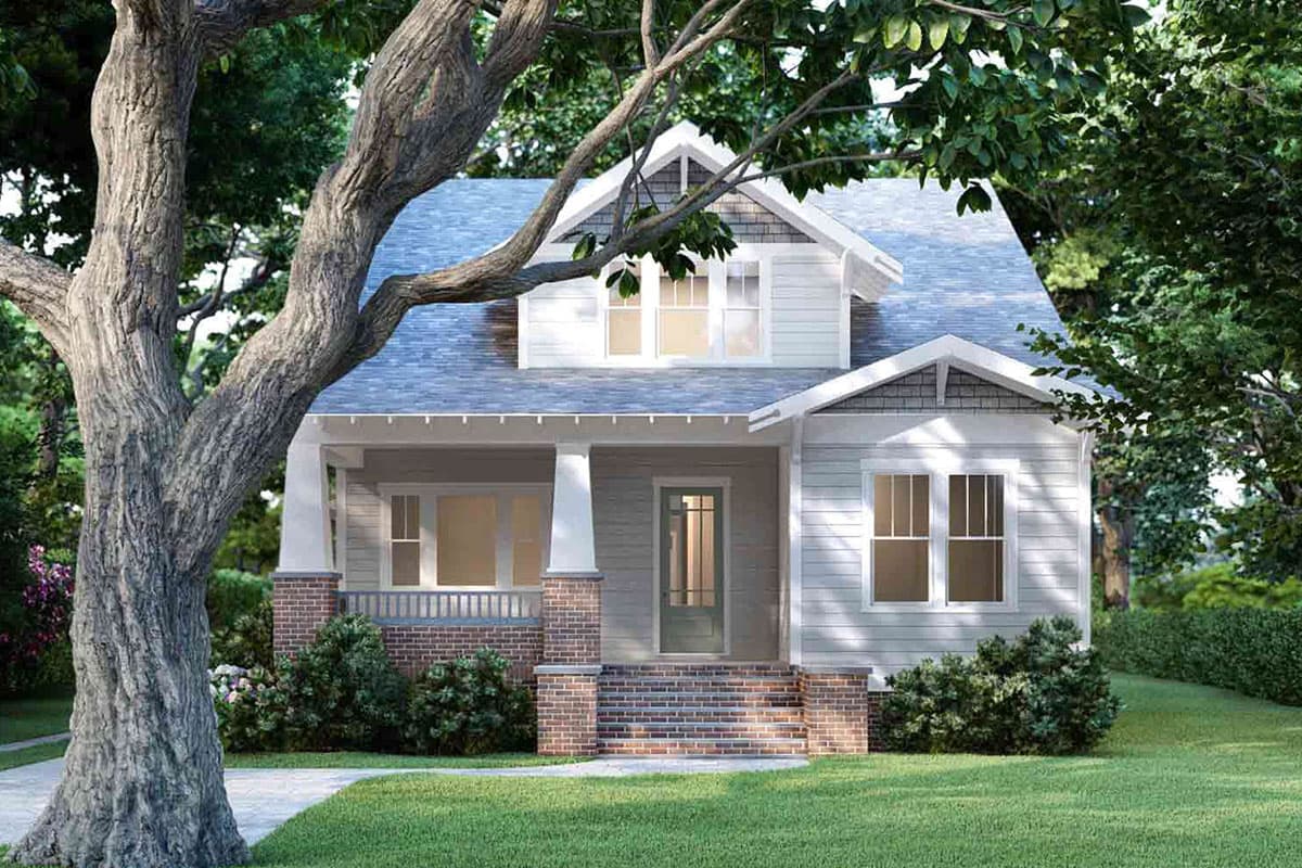 House plan exterior: two-story Craftsman with covered front porch, brick base, and dormer windows.