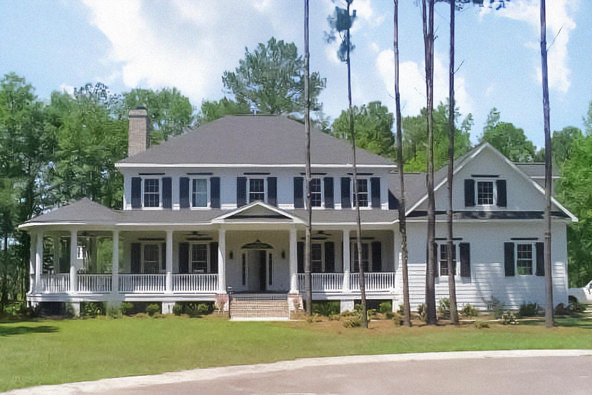House plan exterior. Two-story Colonial with covered porch, multiple dormers, and a gable roof. Includes a chimney.
