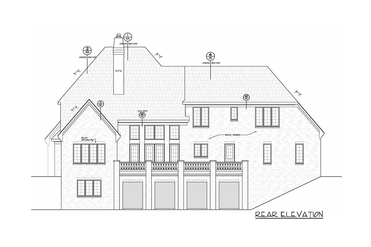 Rear elevation drawing of house plan featuring brick veneer, multiple gables, dormers, and an ornate balcony above garage doors.