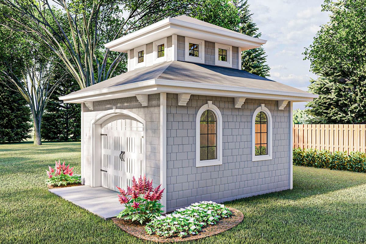 House plan exterior: Single-story structure with arched garage door, shingle siding, and a cupola with dormer windows.