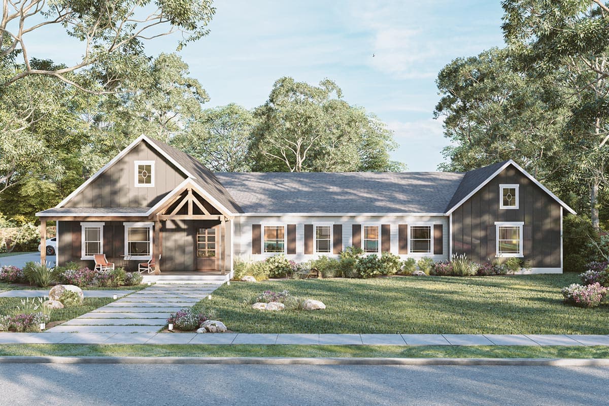 House plan exterior. Ranch style with a front porch, multiple gables, and shuttered windows. One story with a detached garage.