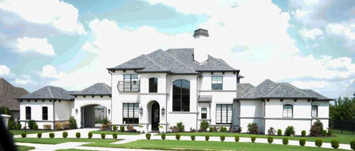 House plan exterior: two-story modern home with arched entry, balconies, multiple gables, and attached porte-cochère.