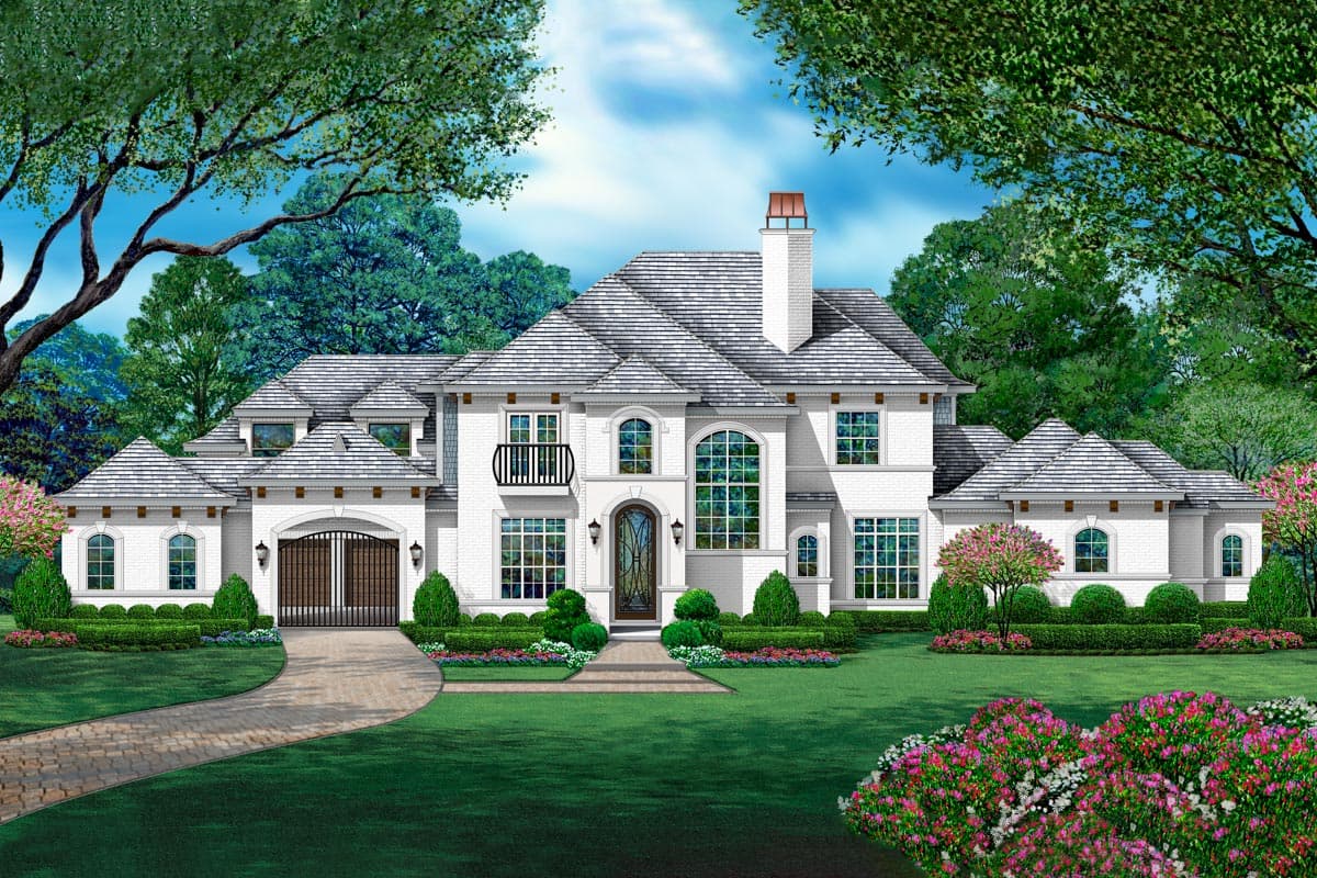 House plan exterior with two stories, featuring a tile roof, arched windows, a wrought-iron balcony, and a porte-cochere with a gated garage.