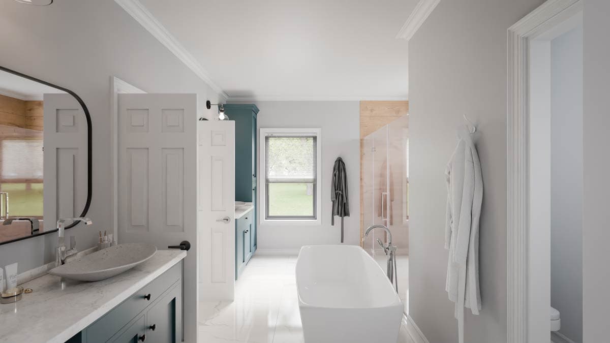 Modern bathroom interior with freestanding tub, vanity with vessel sink, and glass-enclosed shower.