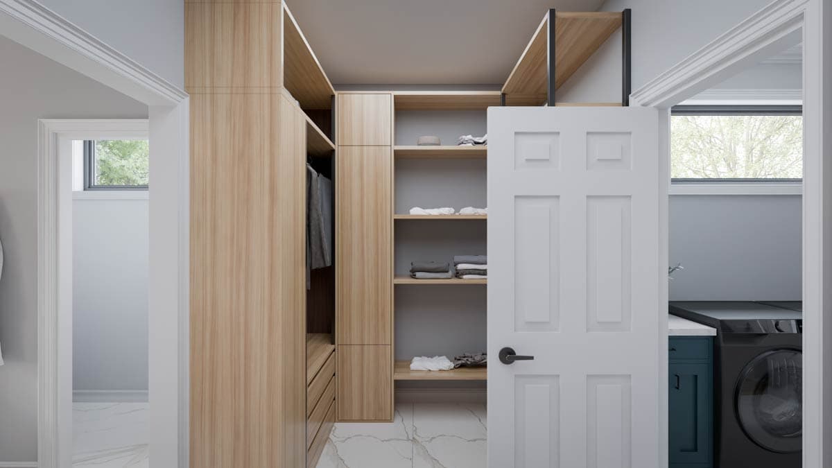U-shaped closet with light wood cabinetry and shelves. Adjacent laundry area visible through open doorway.