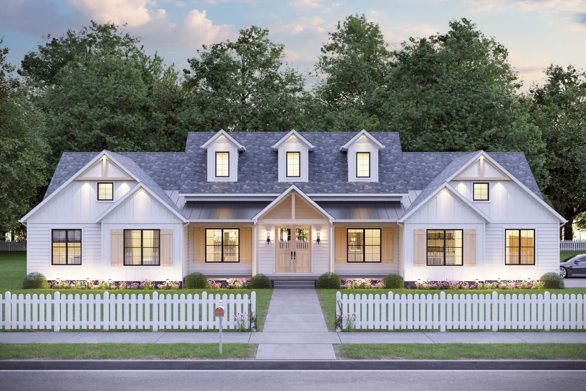 House plan exterior featuring a farmhouse style, three dormers, gabled roof, and a covered front porch with double doors and a white picket fence.