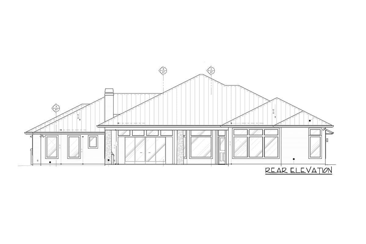 Rear elevation house plan drawing showing a single-story home with a metal roof, multiple gables, a chimney, and large windows.