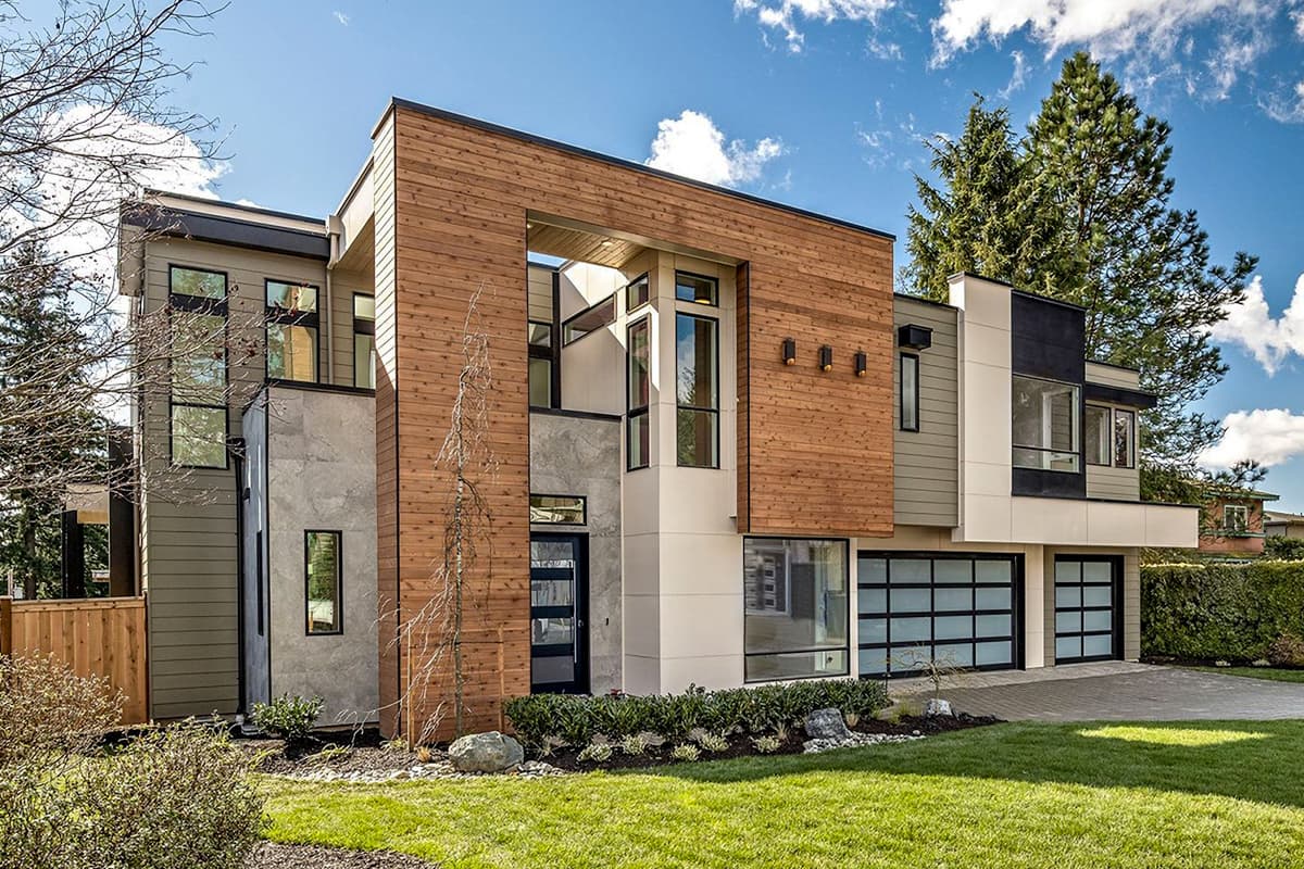 House plan exterior. Modern style, two-story home with wood siding, large windows, and an attached two-car garage.