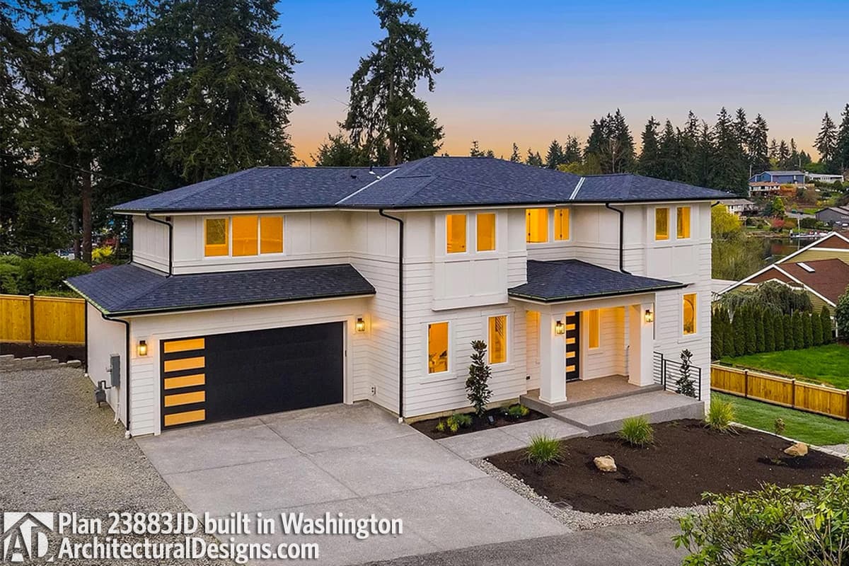 Two-story Modern Farmhouse exterior plan with covered front porch, prominent gables, and attached garage.