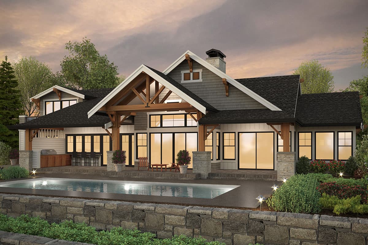 Modern Farmhouse house plan exterior with timber framing, multiple gables, stone accents, and rear pool.