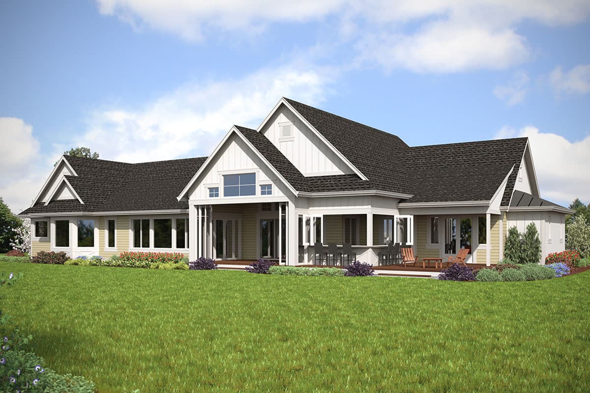 House plan exterior: Ranch style, one story, featuring multiple gables, a covered porch with columns, and large windows.