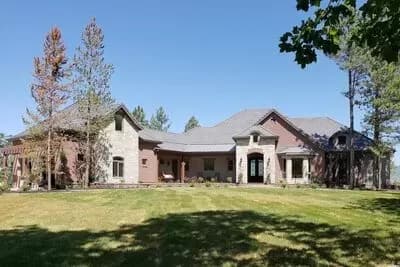 Spacious French Country Home Plan with Deluxe Owner's Suite