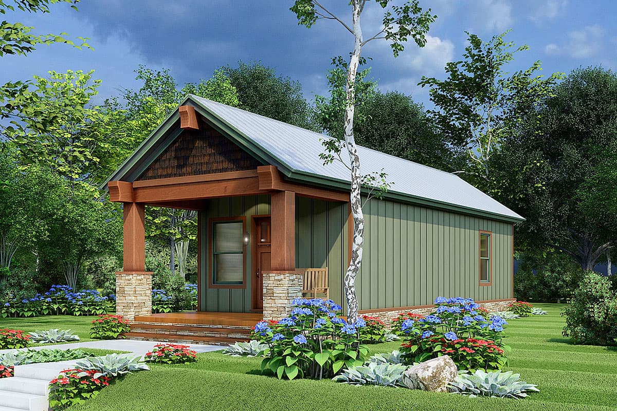 House plan exterior: Single-story dwelling with a gable roof, covered porch with stone bases, and cedar shake gables.