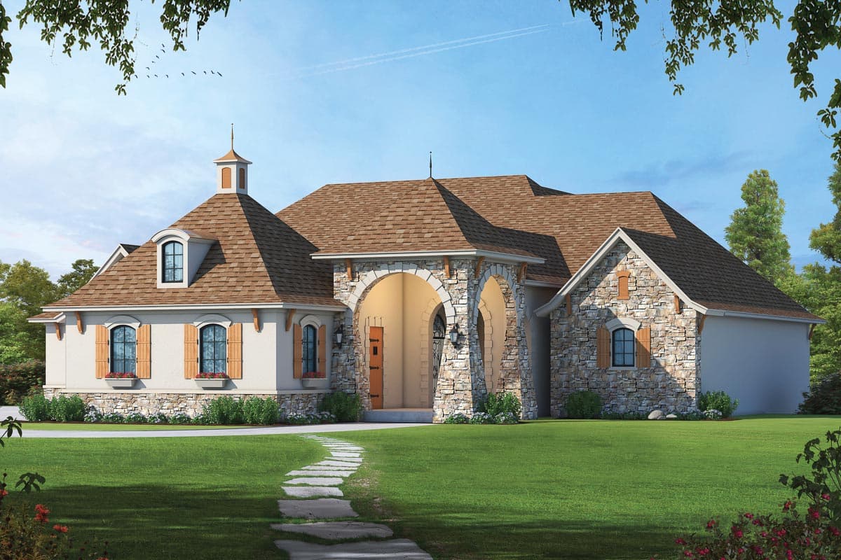 House plan exterior with stone accents, arched entryway, and multiple gables. Features a cupola and shutters on the windows.
