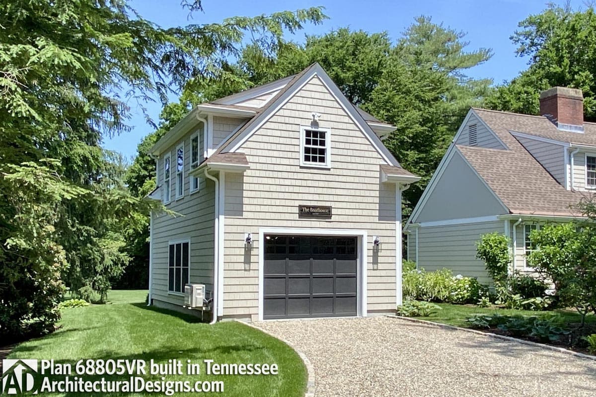 House plan exterior featuring shingle siding, a gable roof, two stories, and a single-car garage.