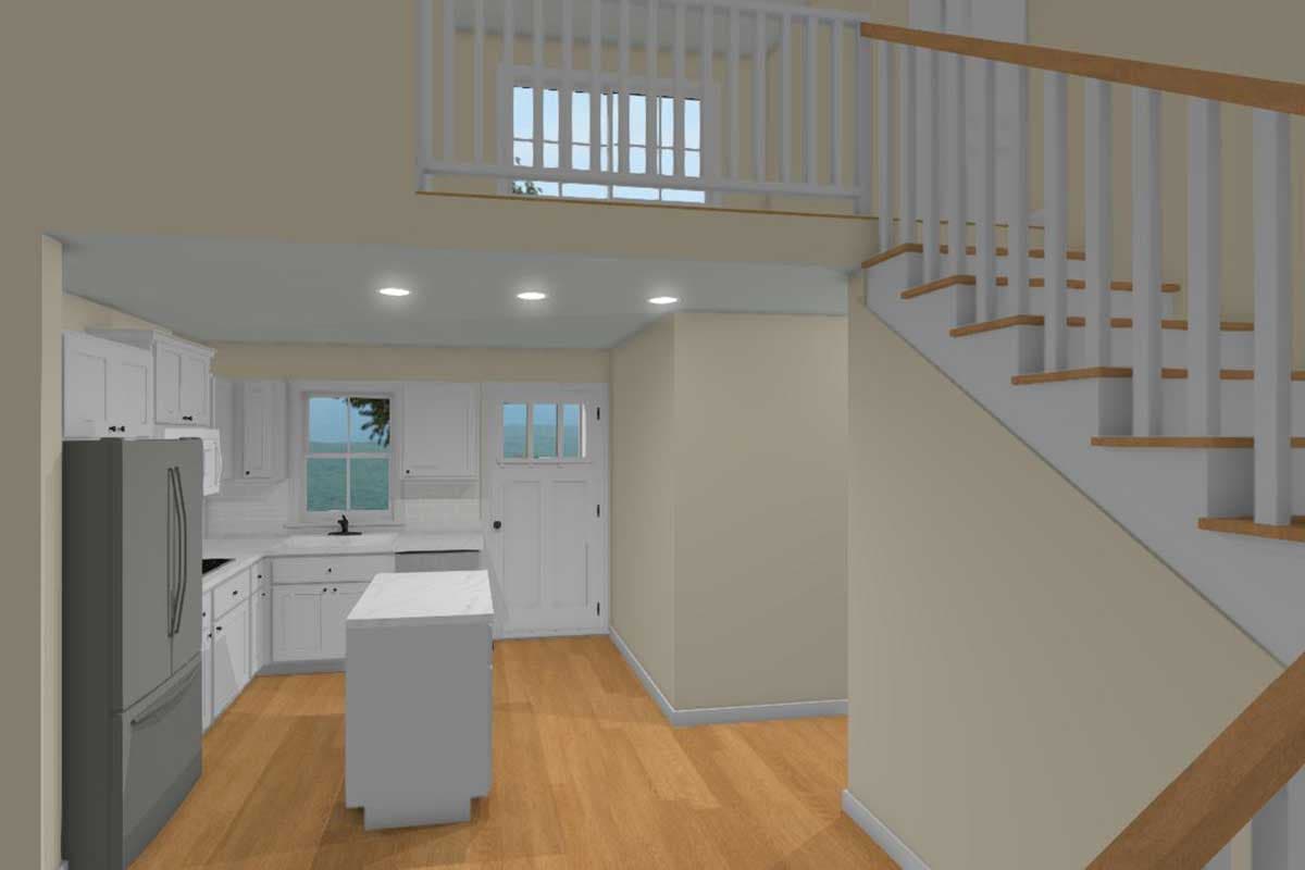 Interior view of a house plan showing a kitchen with an island and a staircase leading to a loft with a railing.