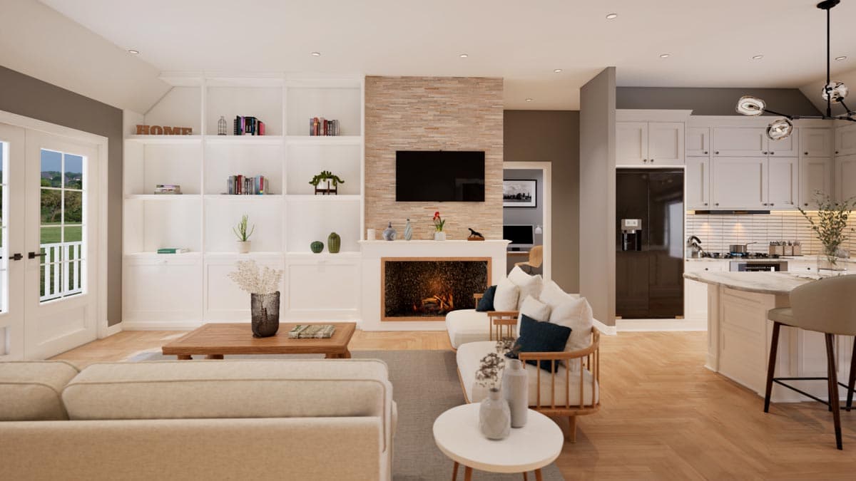Open-concept living area with built-in shelving, fireplace, and adjacent kitchen with island.