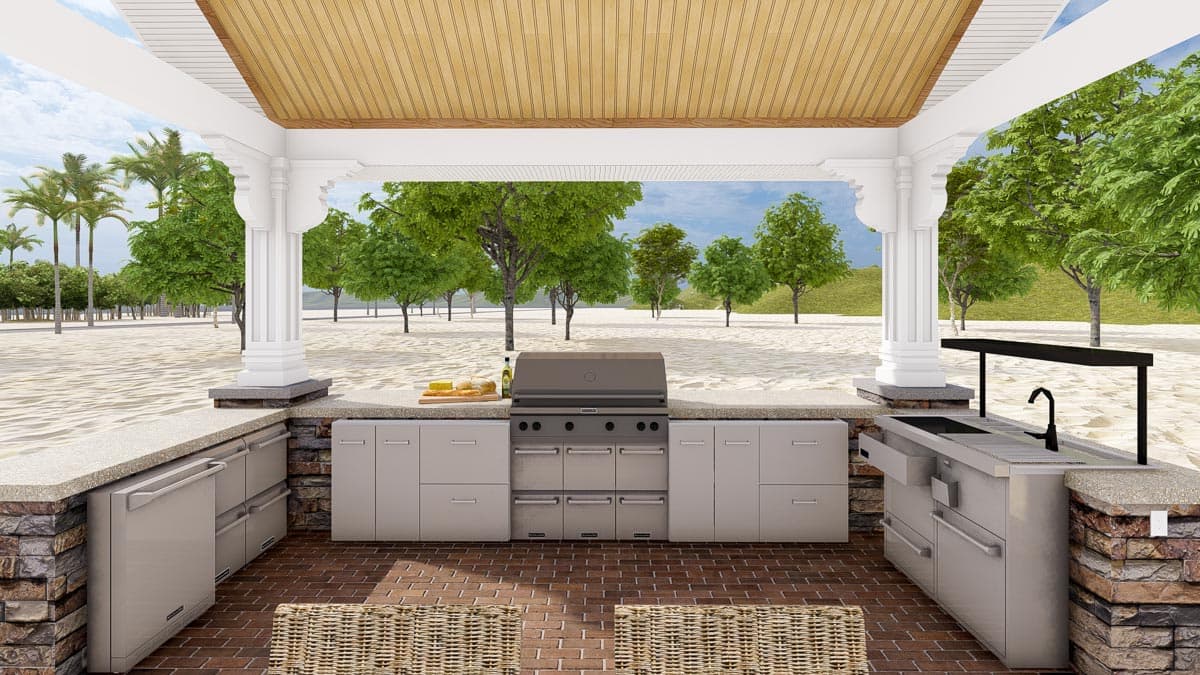 Outdoor kitchen with grill, sink, refrigerator, and cabinetry under a pergola with wood ceiling.