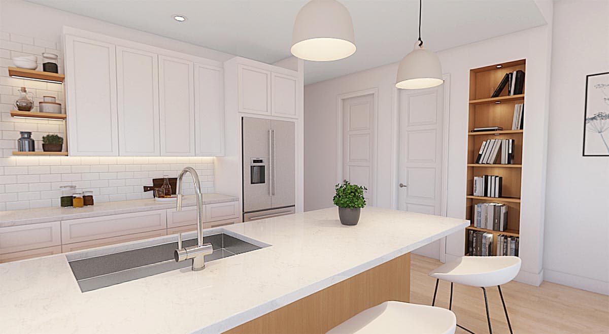 Kitchen interior with island sink, white cabinets, subway tile backsplash, stainless steel refrigerator, and built-in bookshelf.